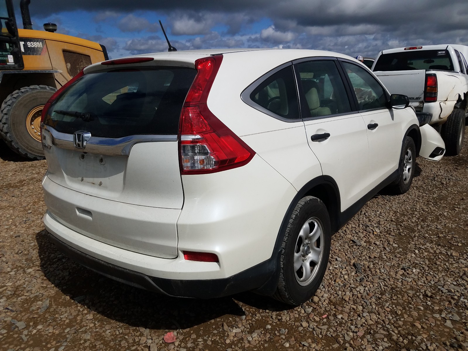 Photo 4 from auction – 2016 HONDA CR-V LX with VIN 5J6RM3H30GL022448