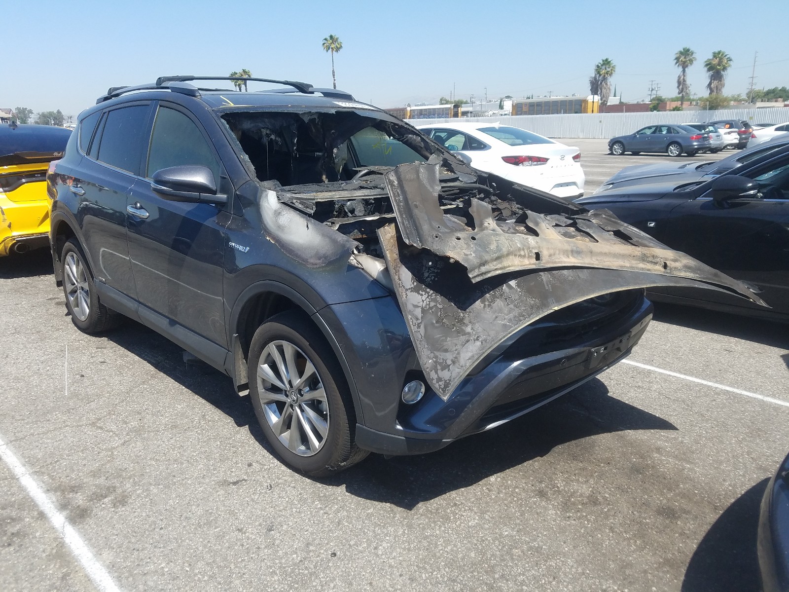 Photo 1 from auction – 2018 TOYOTA RAV4 HV LI with VIN JTMDJREV0JD249237