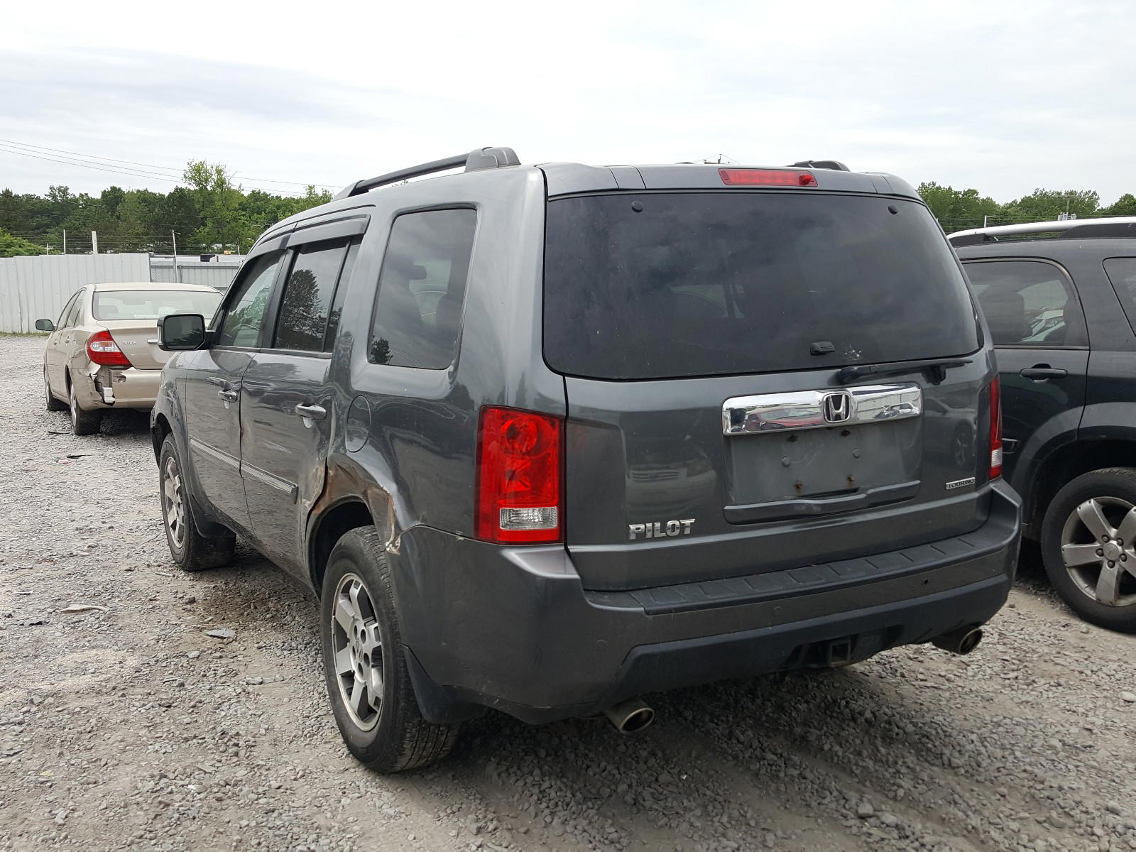 Photo 3 from auction – 2011 HONDA PILOT TOUR with VIN 5FNYF3H95BB036812