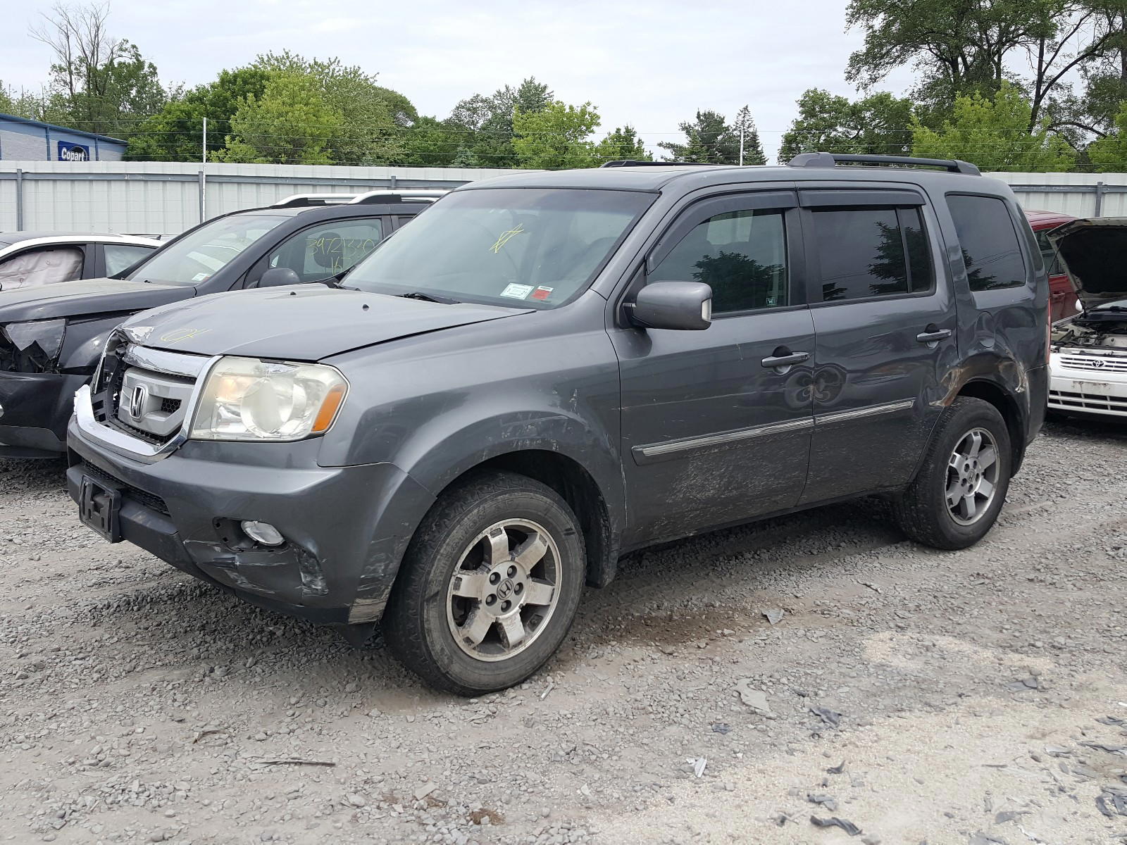 Photo 2 from auction – 2011 HONDA PILOT TOUR with VIN 5FNYF3H95BB036812