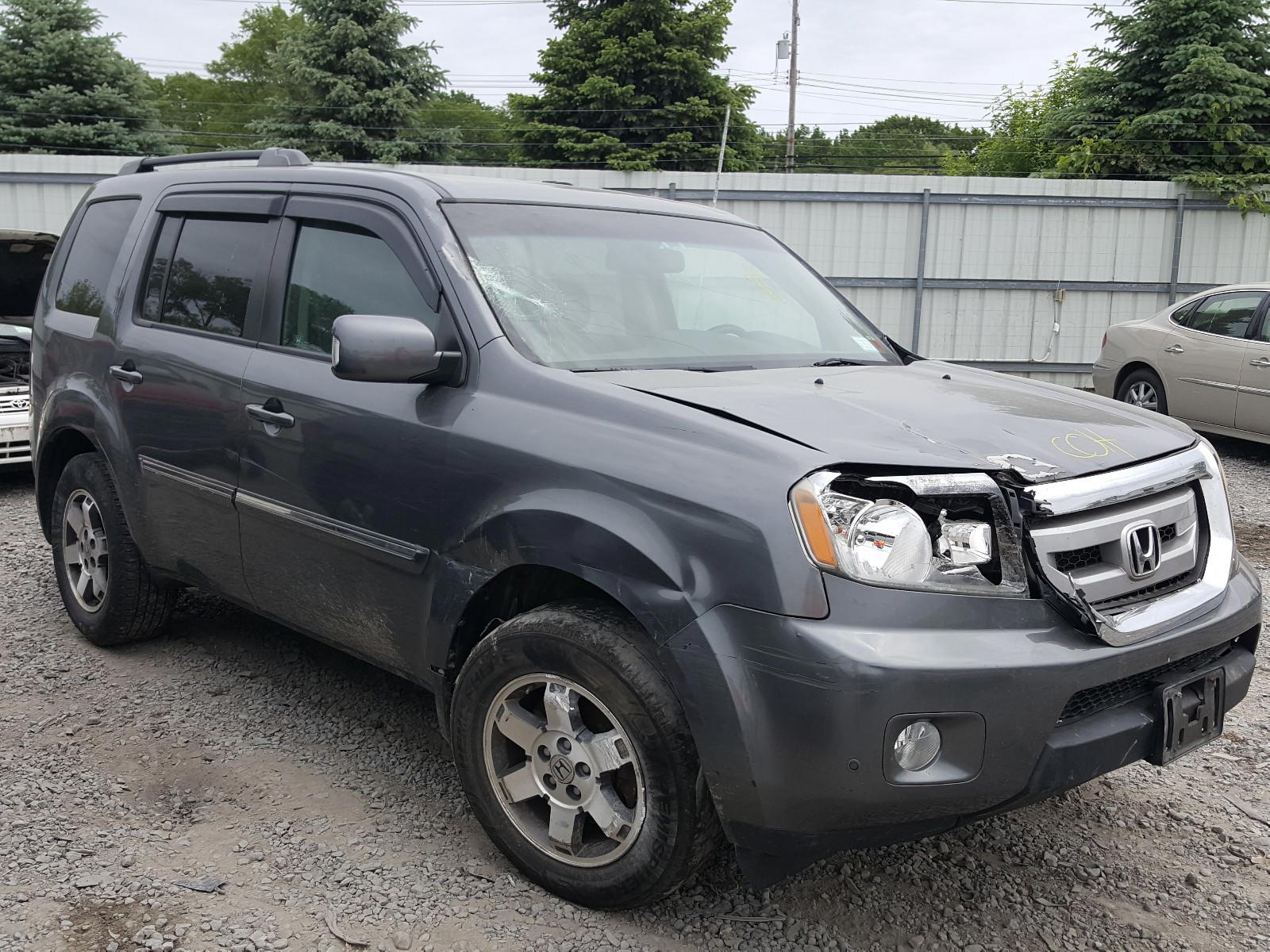 HONDA PILOT TOUR 2011 with VIN 5FNYF3H95BB036812 - Photo from auction
