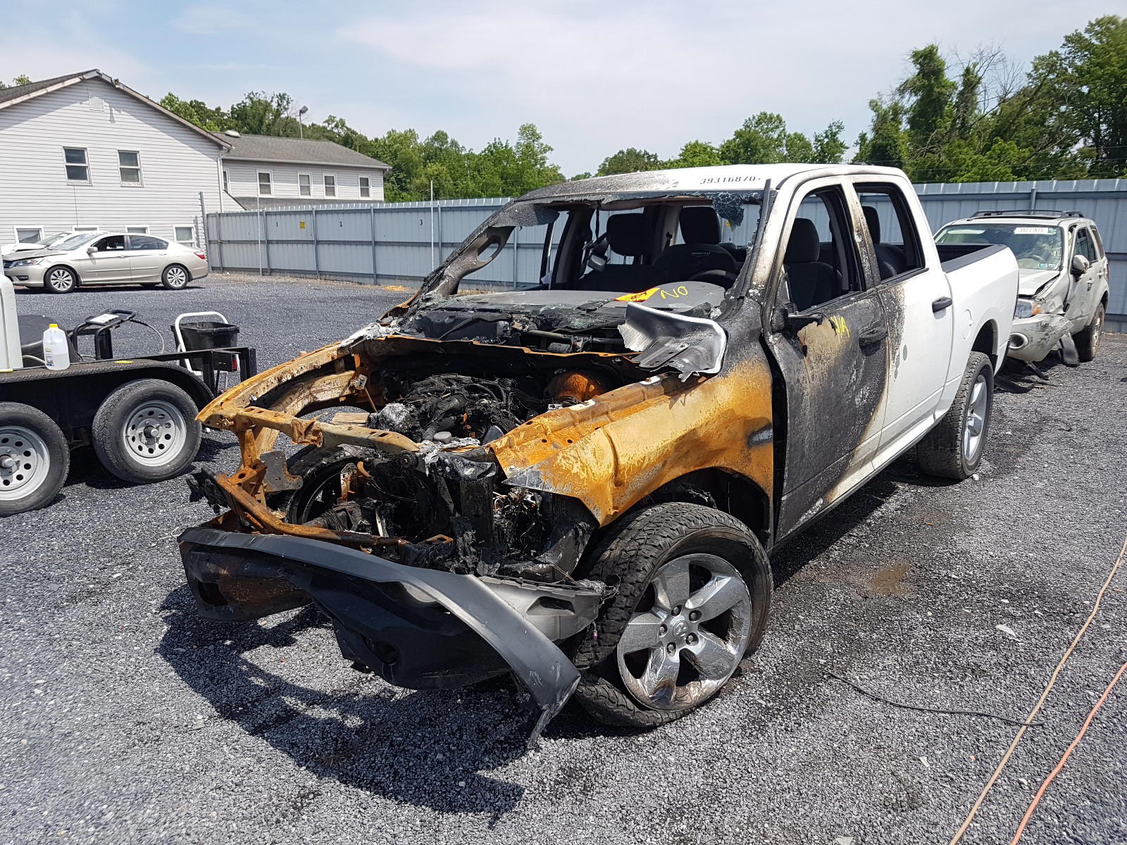 Photo 2 from auction – 2015 RAM 1500 ST with VIN 1C6RR7KM2FS673933