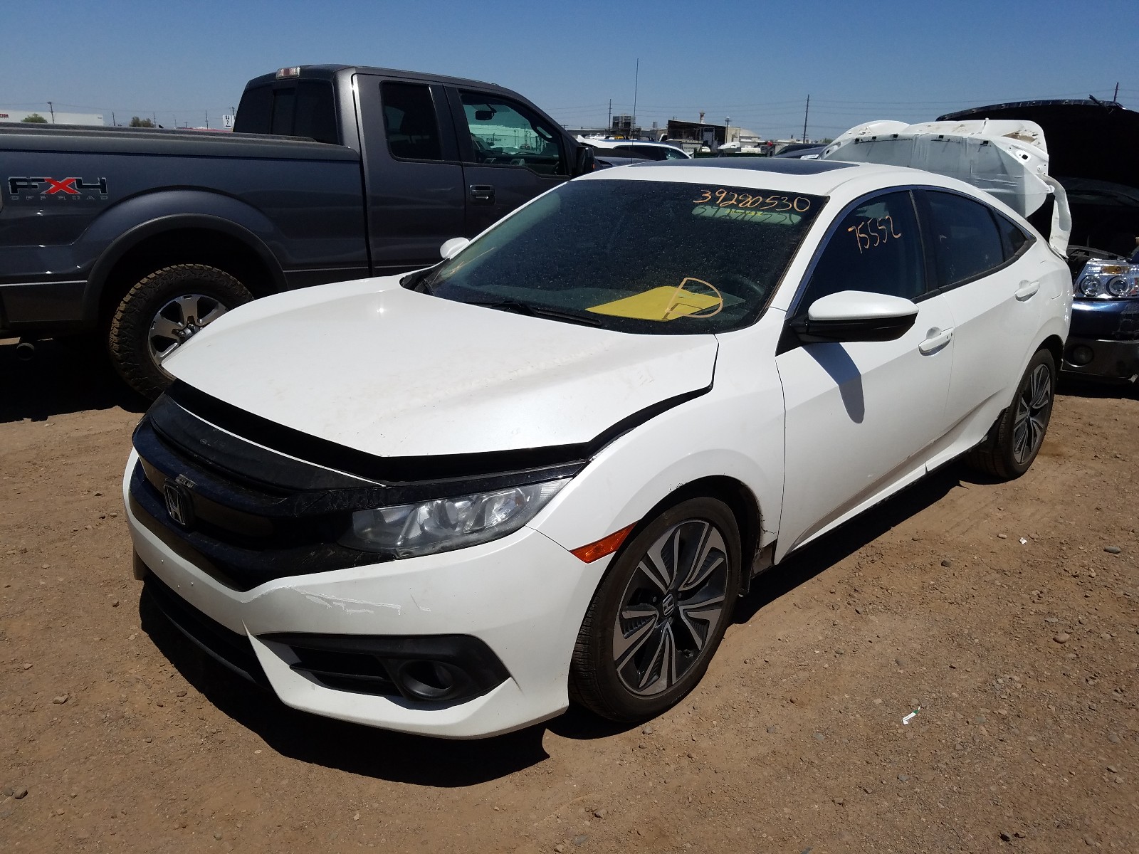 Photo 2 from auction – 2016 HONDA CIVIC EX with VIN 19XFC1F35GE017662
