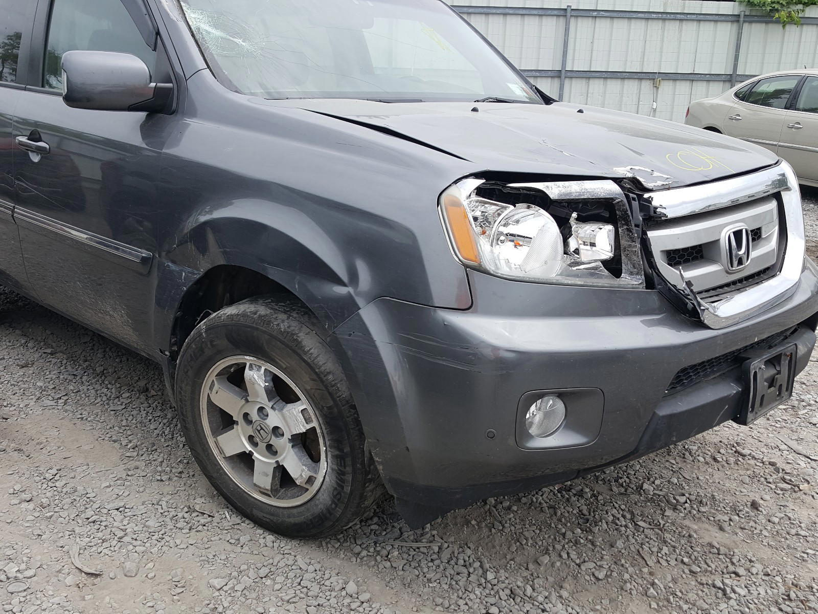 Photo 9 from auction – 2011 HONDA PILOT TOUR with VIN 5FNYF3H95BB036812