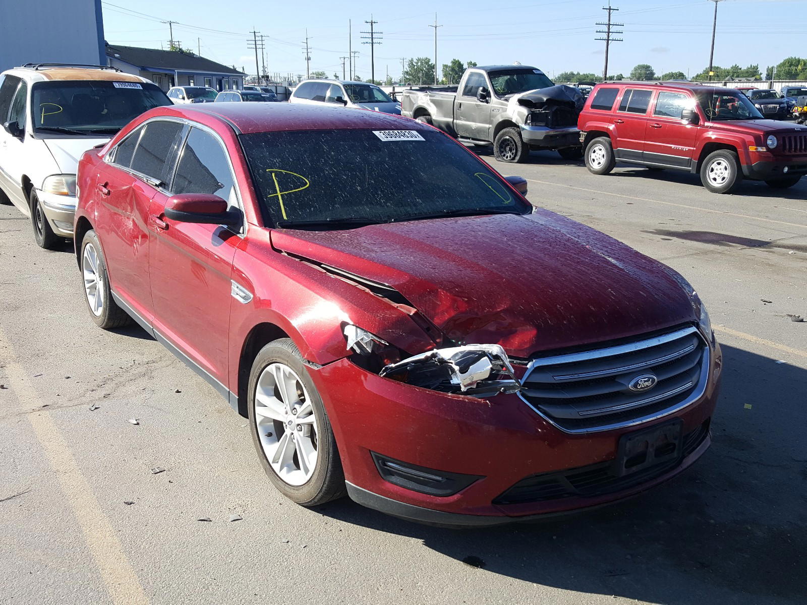 FORD TAURUS SEL 2015 with VIN 1FAHP2E87FG127665 - Photo from auction