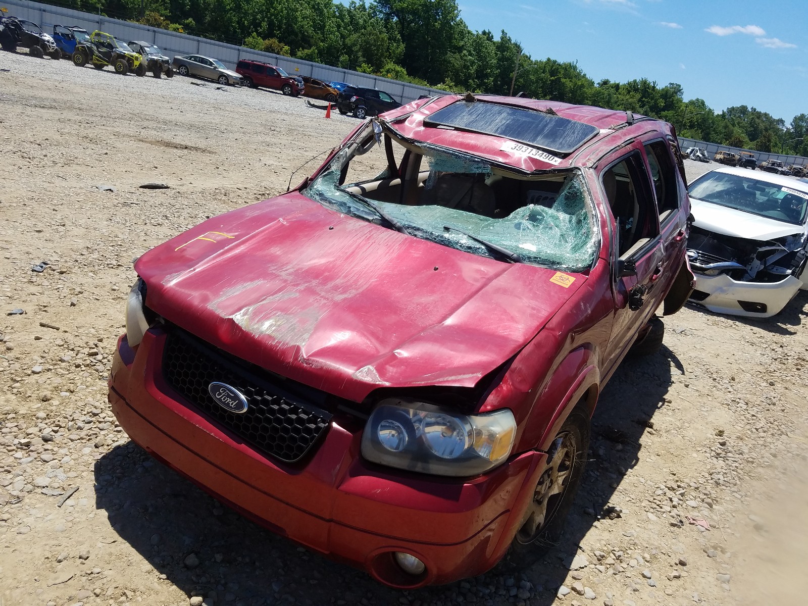Photo 9 from auction – 2007 FORD ESCAPE LIM with VIN 1FMYU04107KA13223