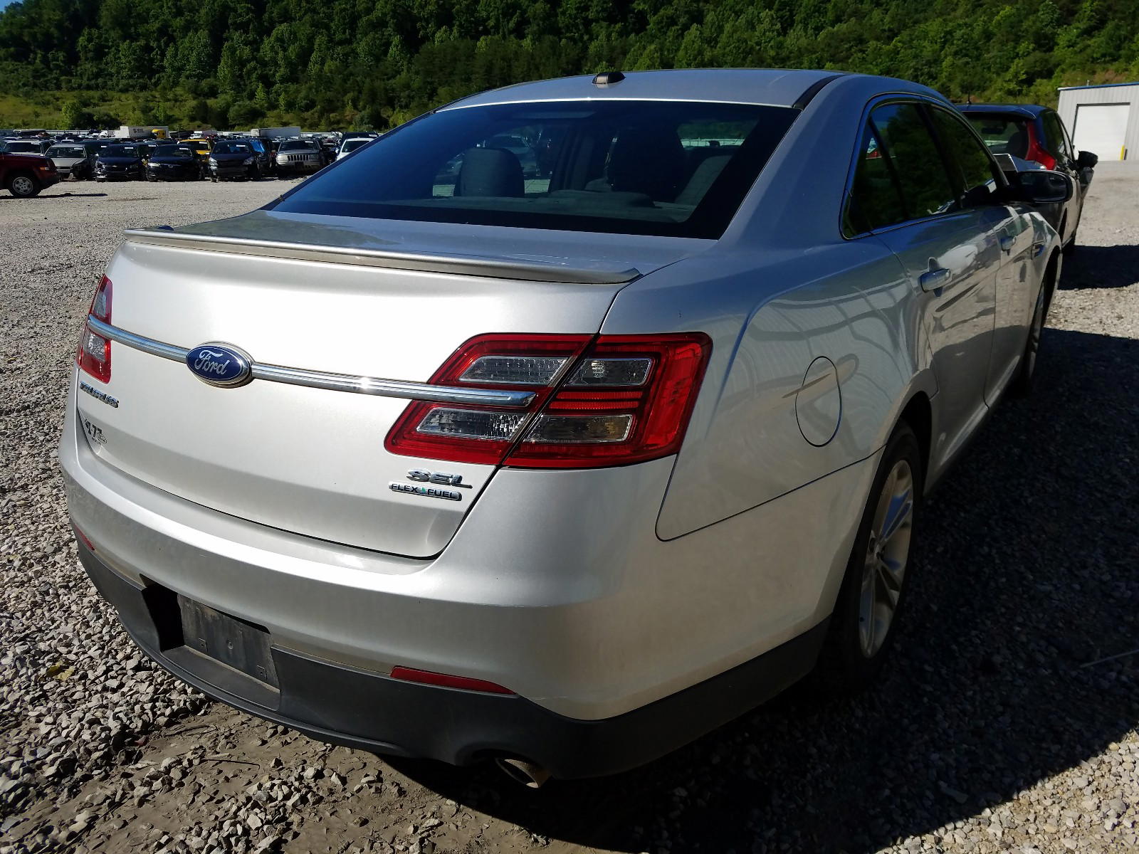 Photo 4 from auction – 2014 FORD TAURUS SEL with VIN 1FAHP2E89EG102295