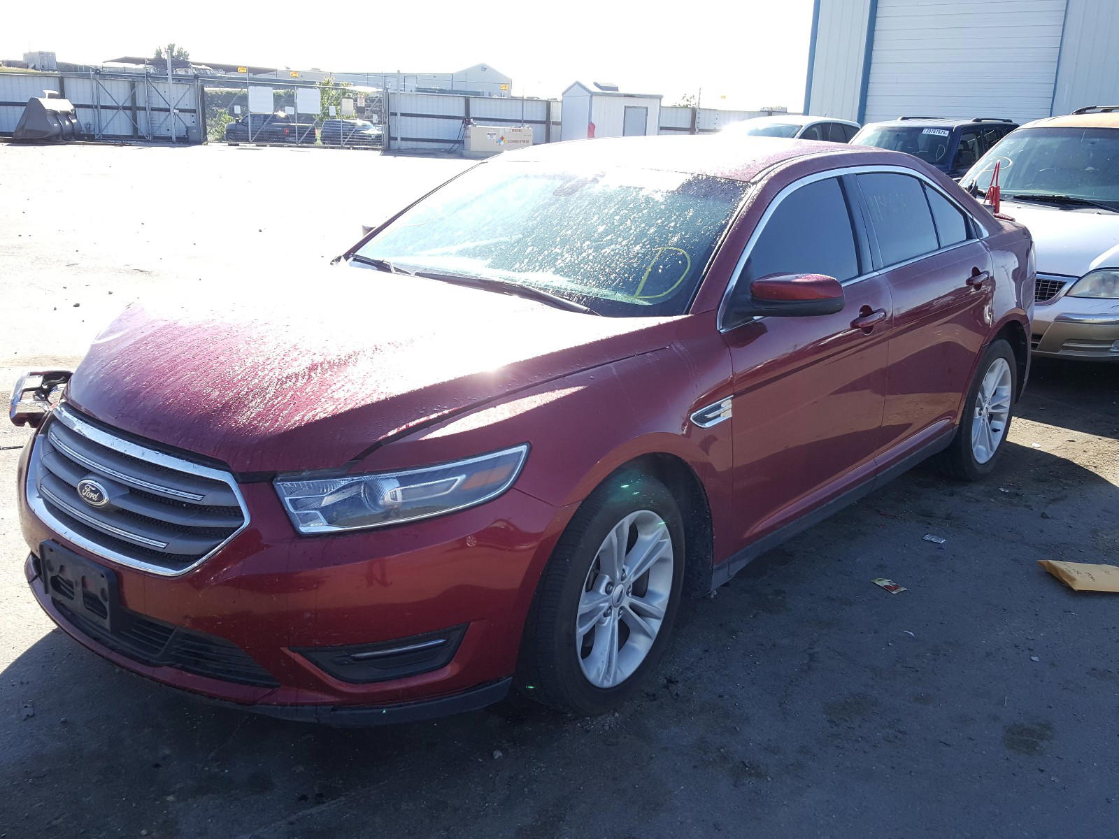 Photo 2 from auction – 2015 FORD TAURUS SEL with VIN 1FAHP2E87FG127665