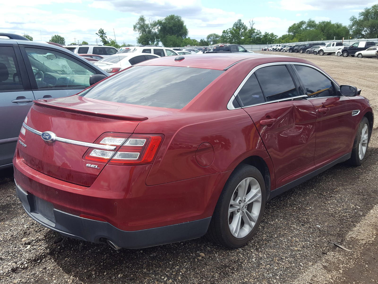 Photo 4 from auction – 2015 FORD TAURUS SEL with VIN 1FAHP2E87FG127665