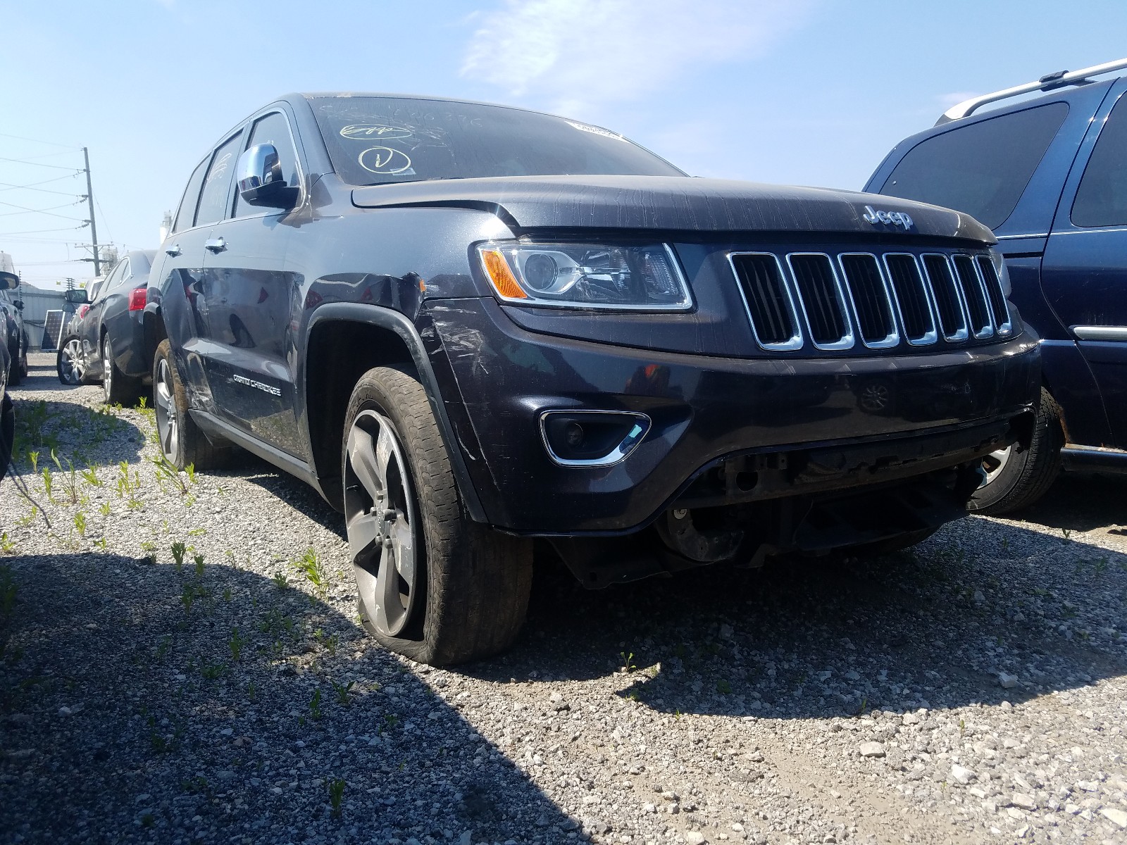 Photo 10 from auction – 2014 JEEP GRAND CHER with VIN 1C4RJFBG0EC567803