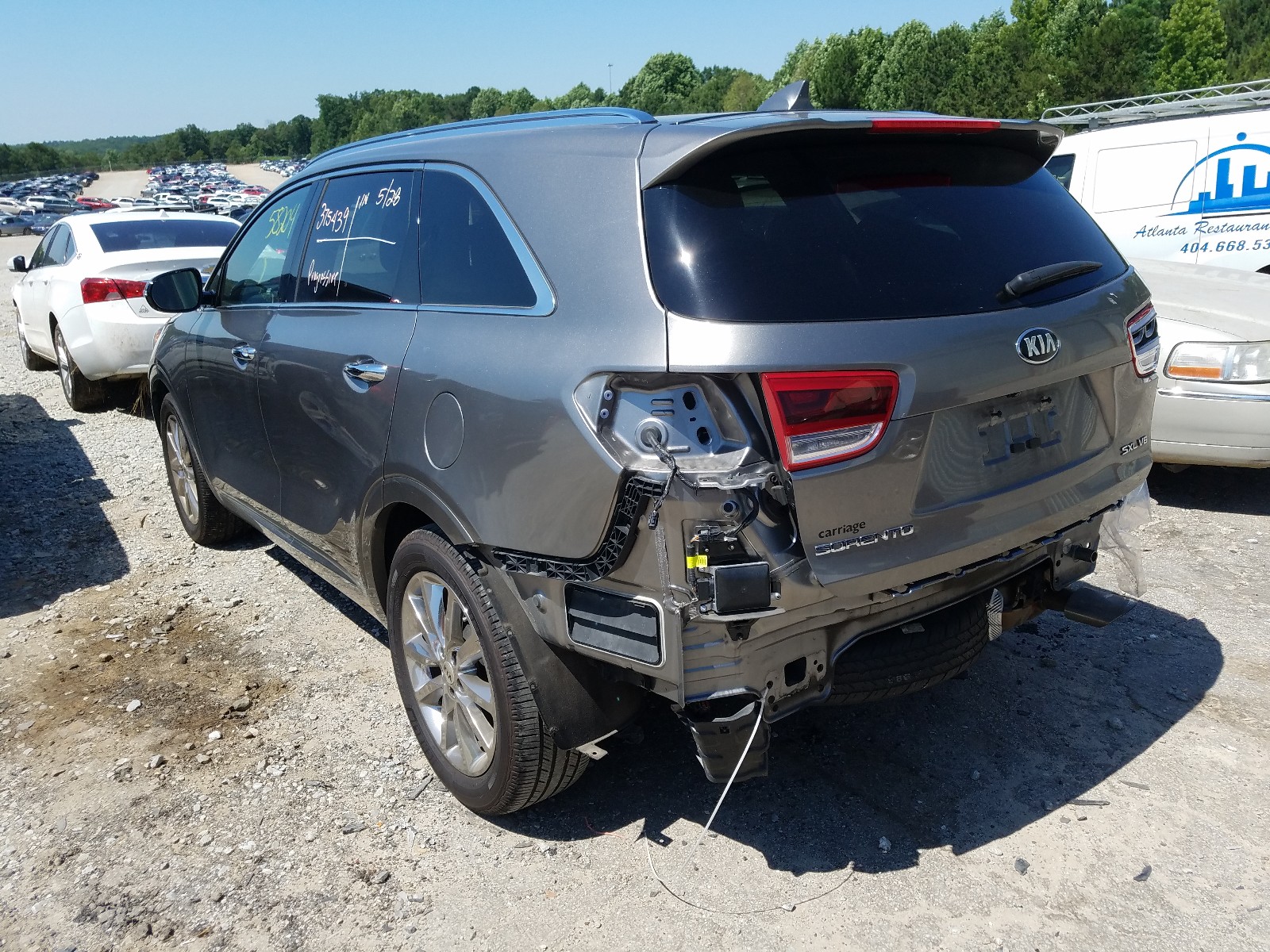 Photo 3 from auction – 2016 KIA SORENTO SX with VIN 5XYPK4A59GG007110