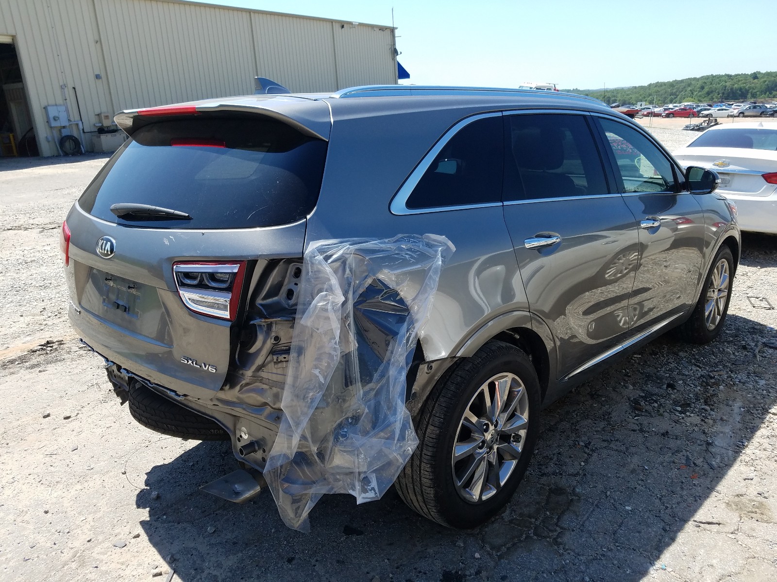 Photo 4 from auction – 2016 KIA SORENTO SX with VIN 5XYPK4A59GG007110