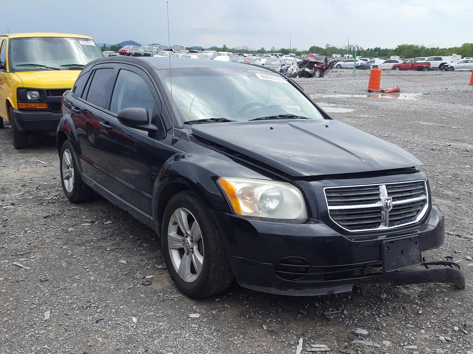 DODGE CALIBER SX 2010 with VIN 1B3CB4HA1AD650995 - Photo from auction