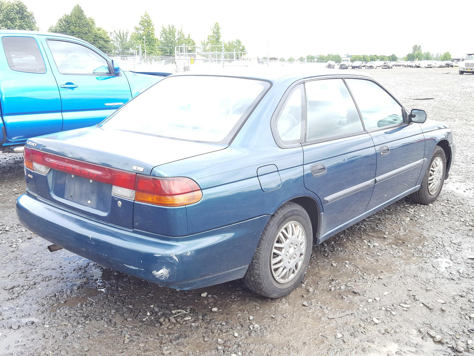 Photo 4 from auction – 1998 SUBARU LEGACY L with VIN 4S3BD4353W7205579