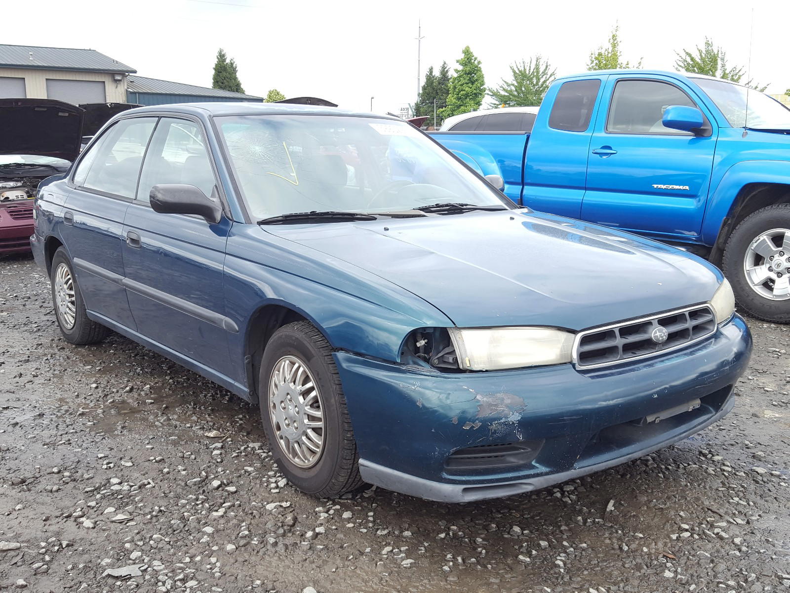 SUBARU LEGACY L 1998 with VIN 4S3BD4353W7205579 - Photo from auction