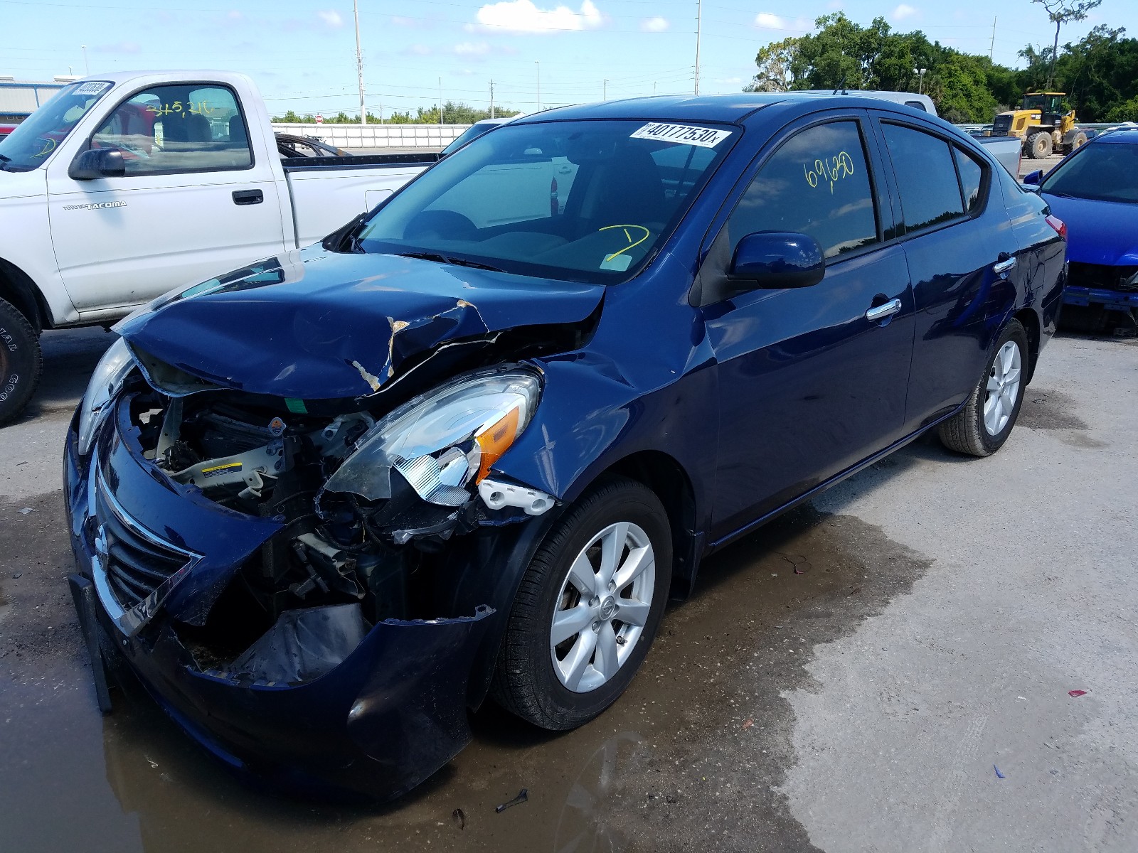 Photo 2 from auction – 2014 NISSAN VERSA S with VIN 3N1CN7AP6EL812290