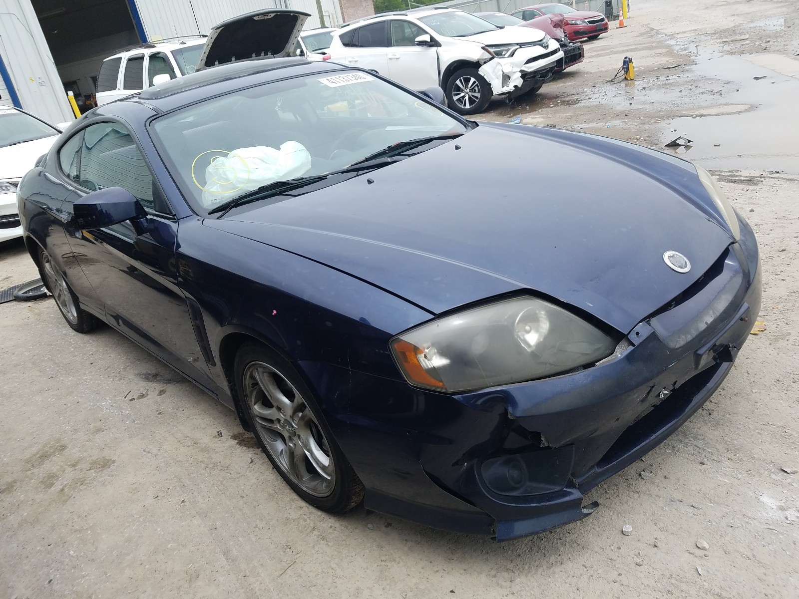 Photo 1 from auction – 2005 HYUNDAI TIBURON with VIN KMHHM65D85U170530