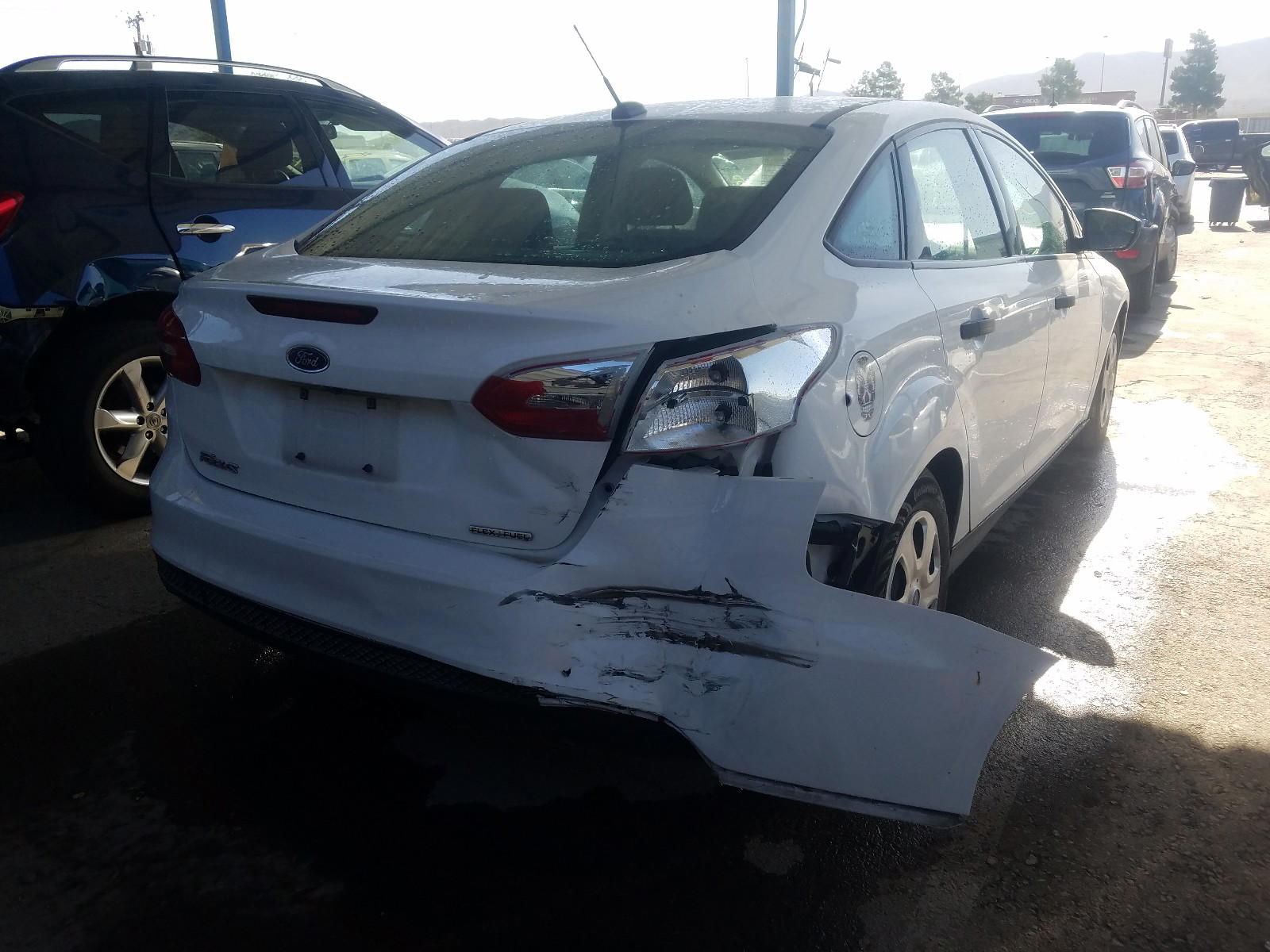 Photo 4 from auction – 2016 FORD FOCUS S with VIN 1FADP3E27GL369140
