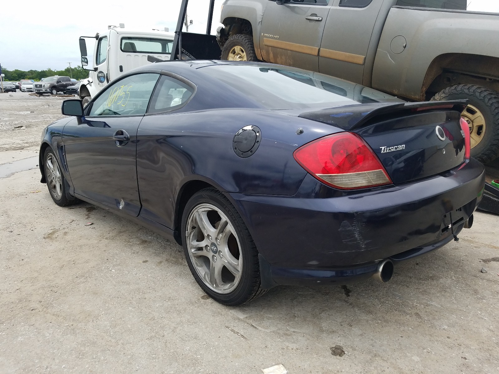 Photo 3 from auction – 2005 HYUNDAI TIBURON with VIN KMHHM65D85U170530