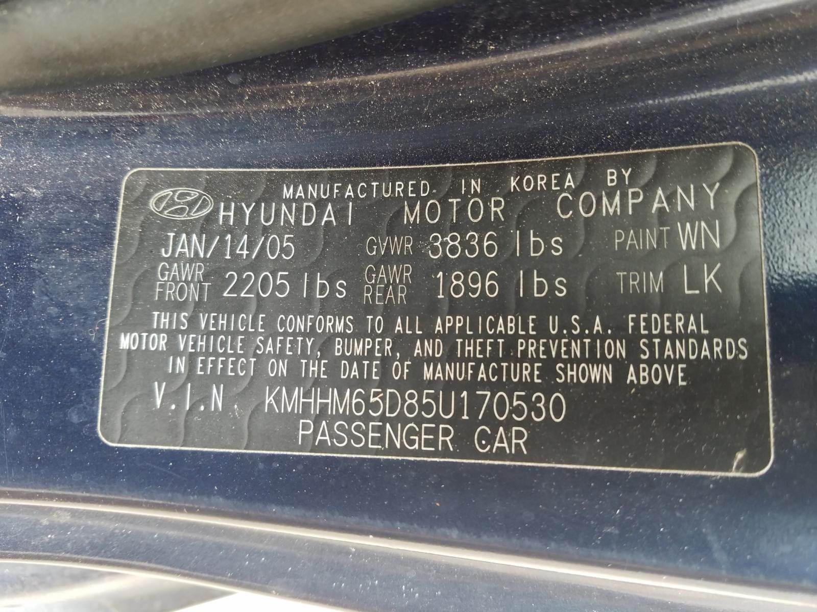 Photo 10 from auction – 2005 HYUNDAI TIBURON with VIN KMHHM65D85U170530