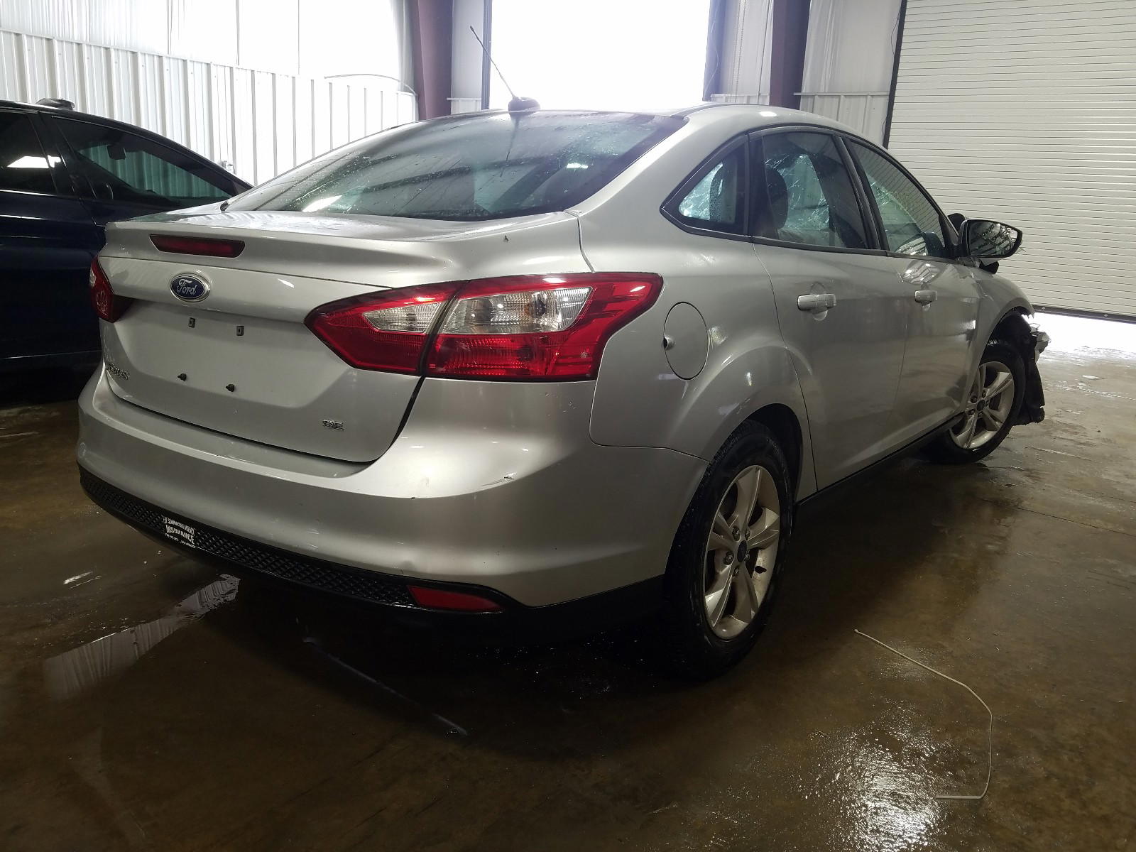 Photo 4 from auction – 2013 FORD FOCUS SE with VIN 1FADP3F29DL232355