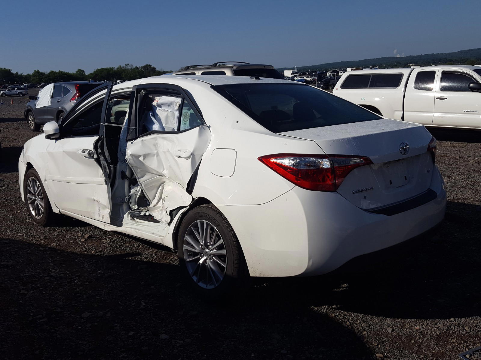 Photo 3 from auction – 2015 TOYOTA COROLLA L with VIN 2T1BURHE0FC373930