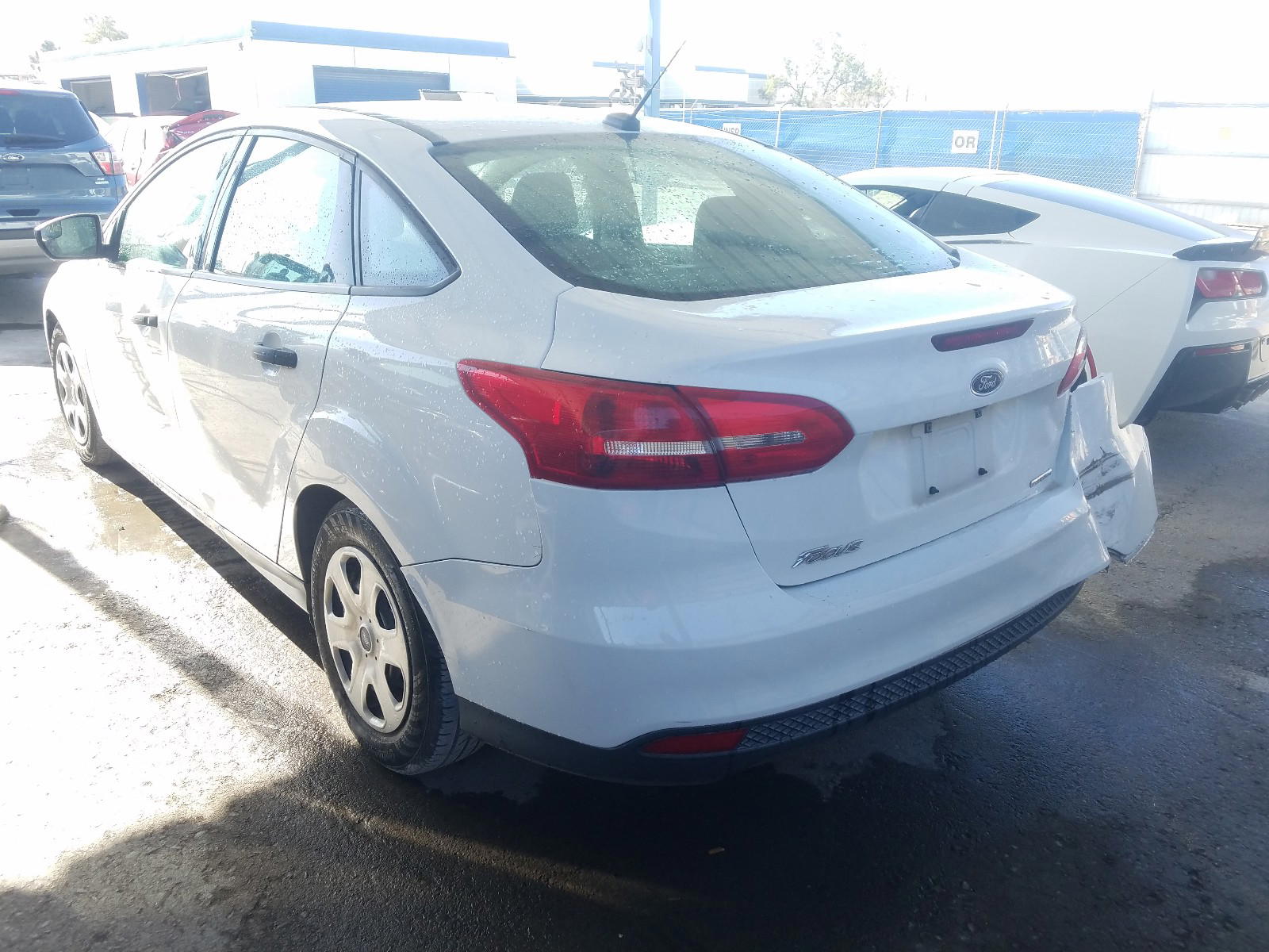 Photo 3 from auction – 2016 FORD FOCUS S with VIN 1FADP3E27GL369140
