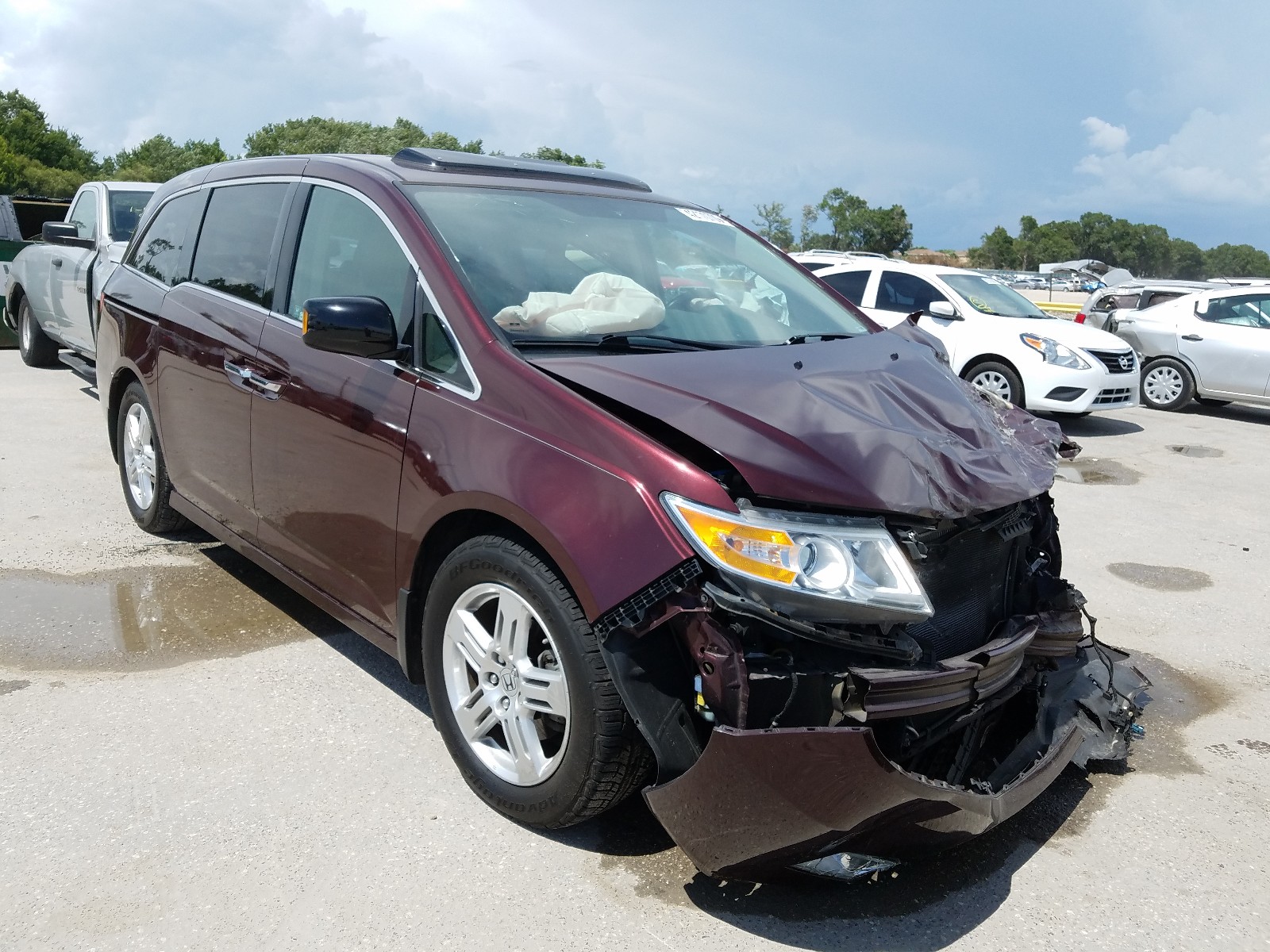 Photo 11 from auction – 2012 HONDA ODYSSEY TO with VIN 5FNRL5H97CB043660