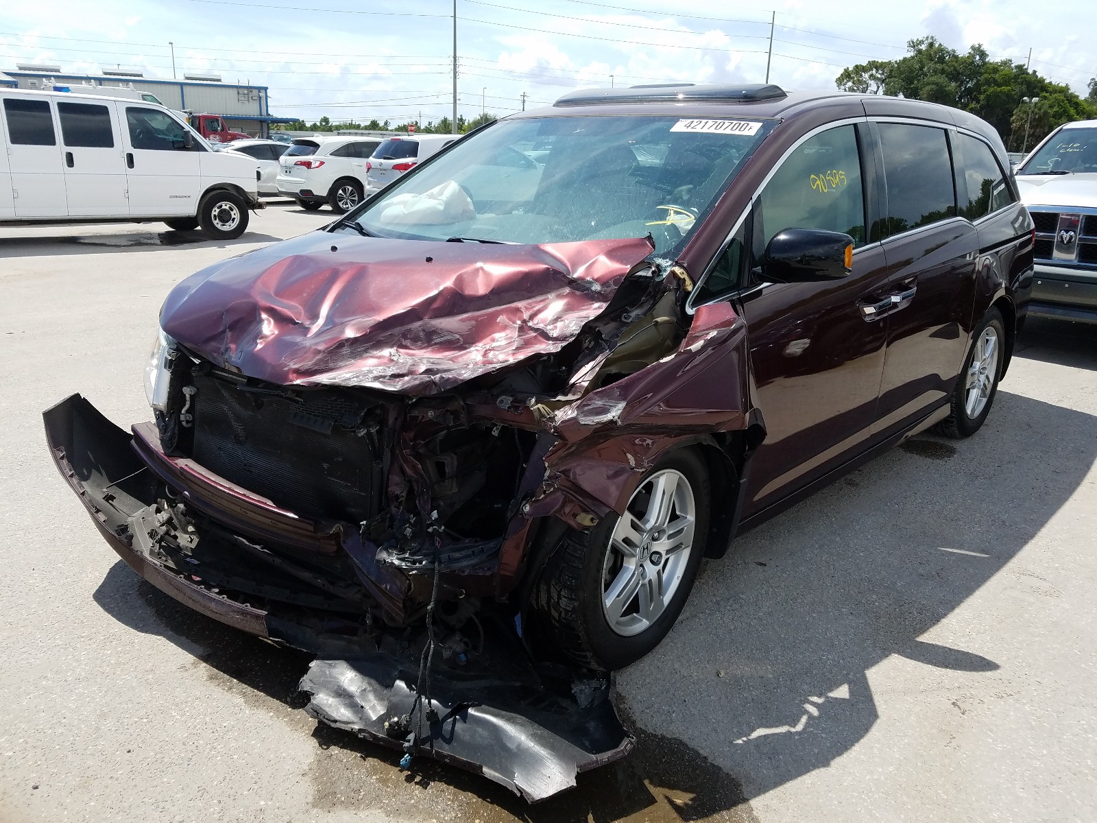 Photo 12 from auction – 2012 HONDA ODYSSEY TO with VIN 5FNRL5H97CB043660