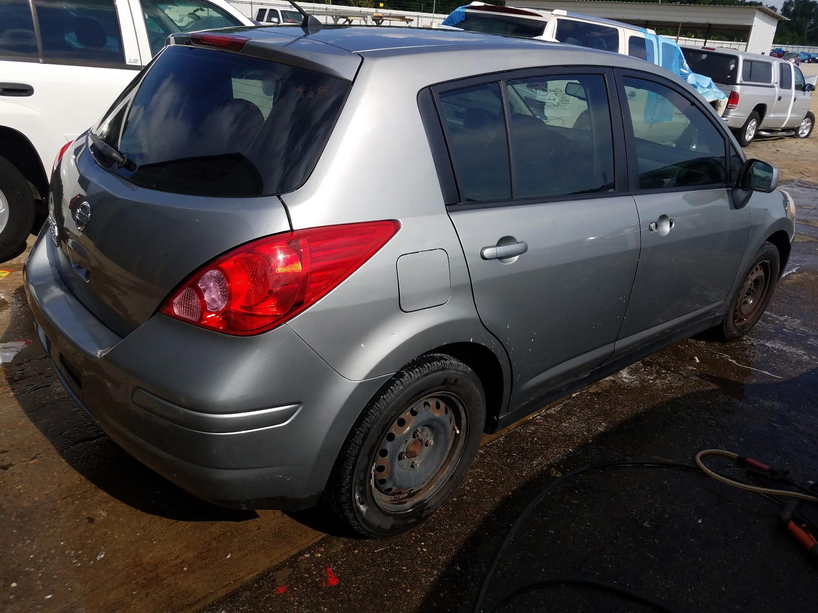 Photo 4 from auction – 2009 NISSAN VERSA S with VIN 3N1BC13E49L478549
