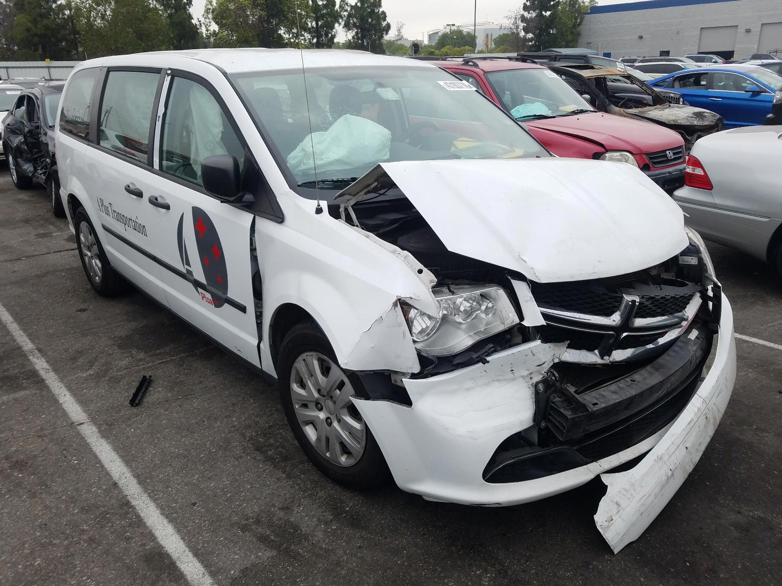DODGE GRAND CARA 2016 with VIN 2C4RDGBG5GR144822 - Photo from auction