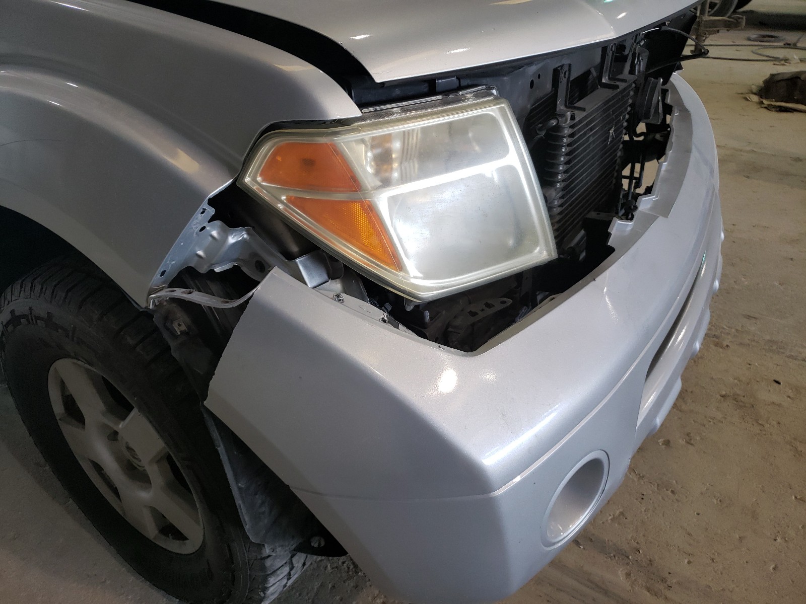 Photo 9 from auction – 2005 NISSAN FRONTIER K with VIN 1N6BD06T25C457975