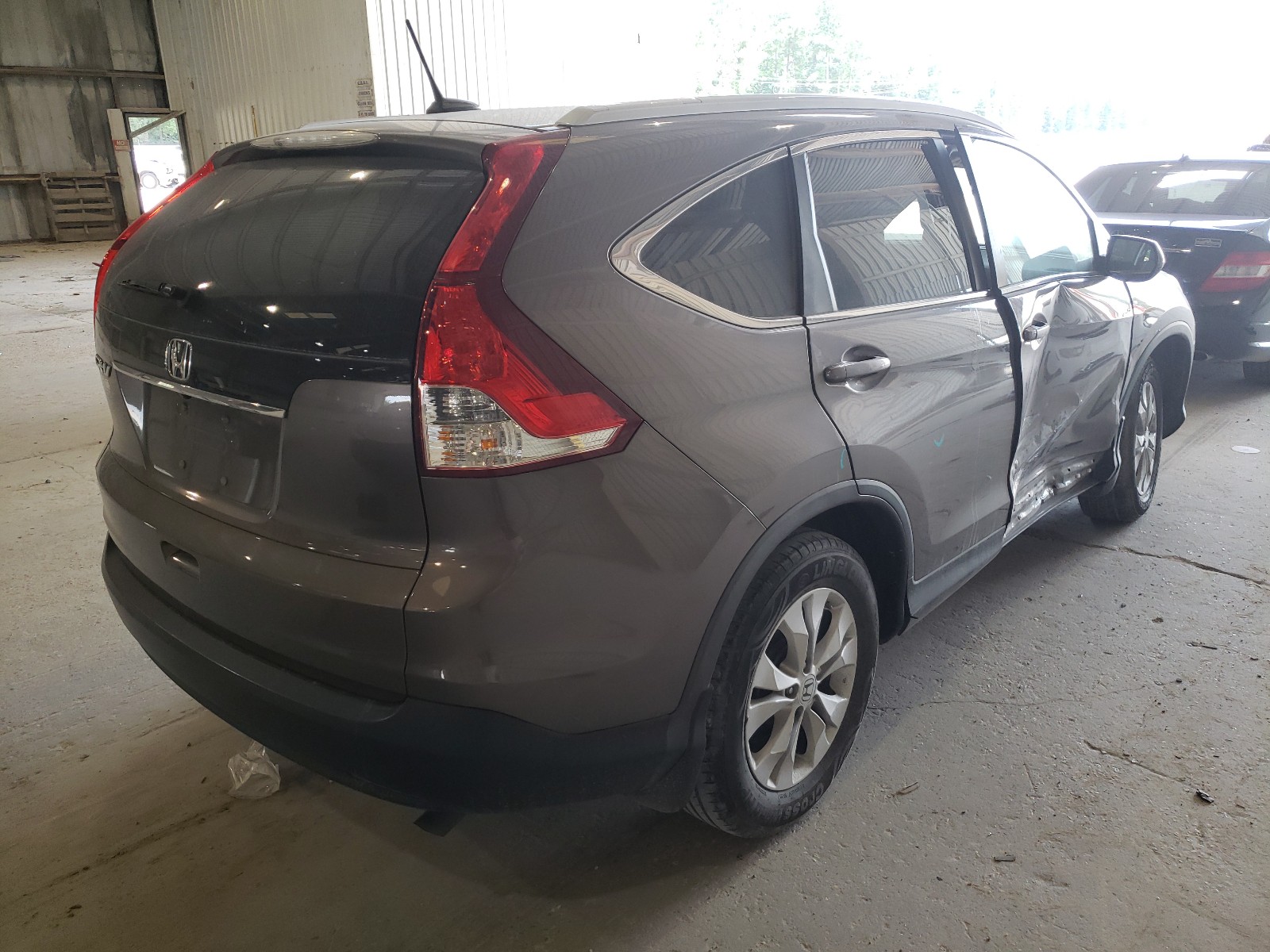 Photo 4 from auction – 2014 HONDA CR-V EXL with VIN 2HKRM3H75EH533986