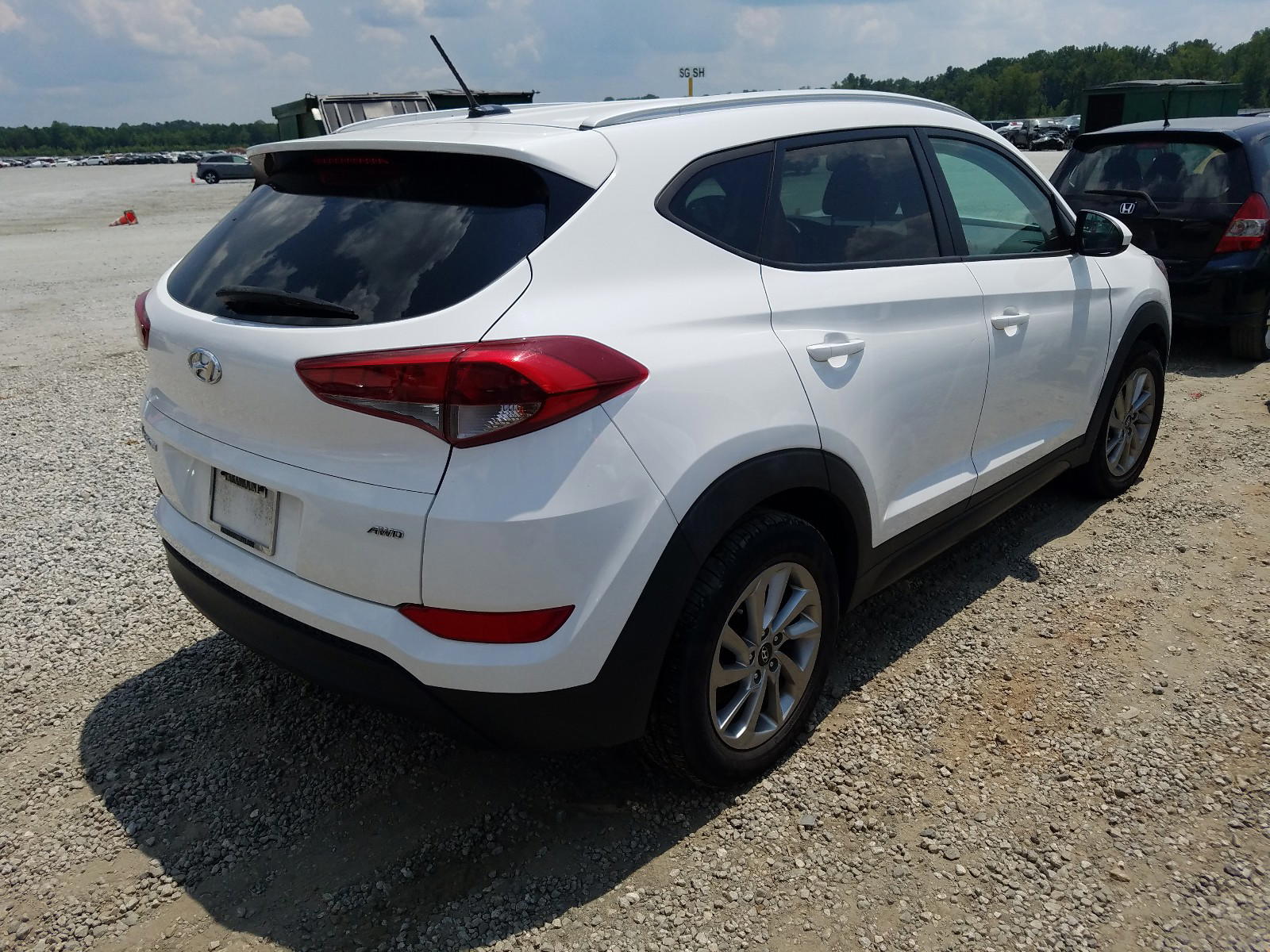Photo 4 from auction – 2016 HYUNDAI TUCSON LIM with VIN KM8J3CA43GU122672