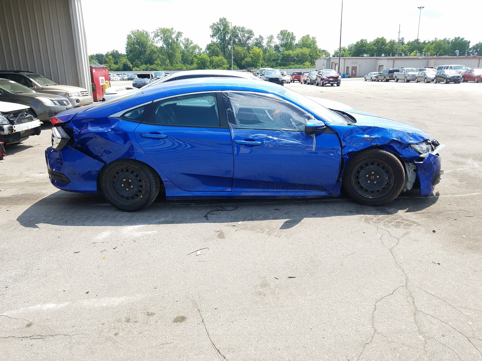 Photo 9 from auction – 2018 HONDA CIVIC LX with VIN 19XFC2F56JE020519