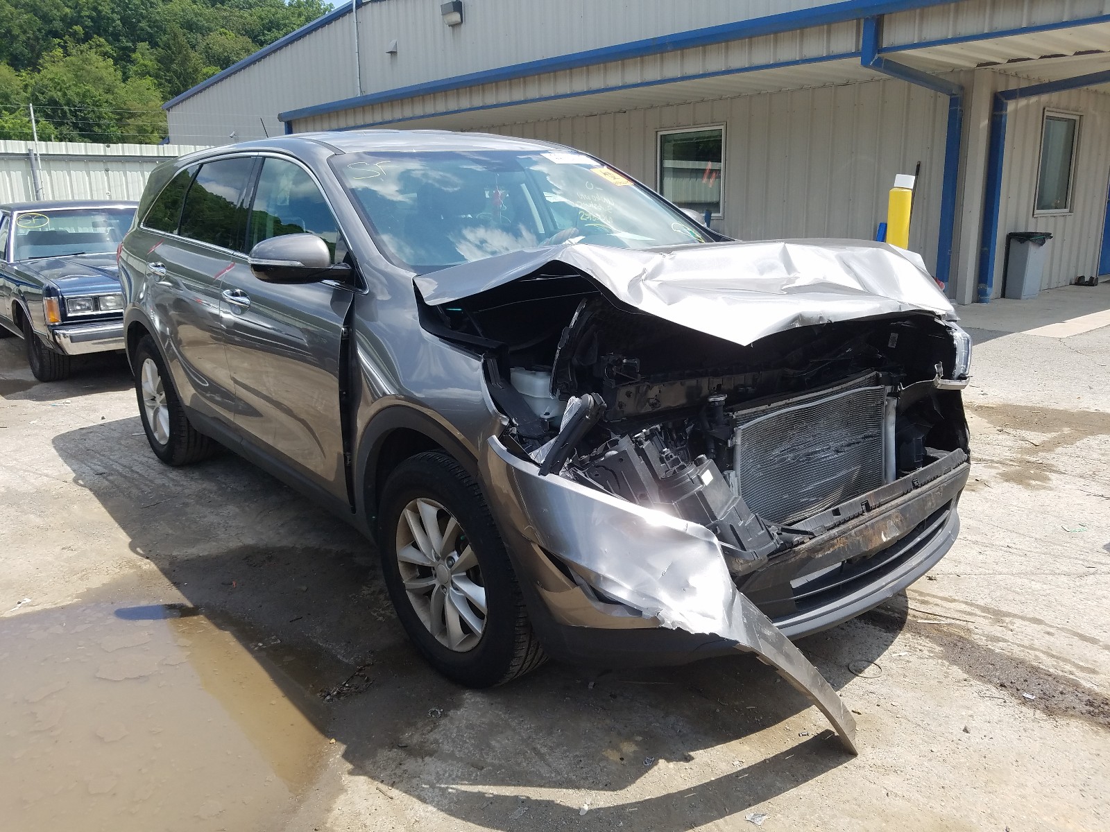 KIA SORENTO LX 2016 with VIN 5XYPG4A39GG016955 - Photo from auction