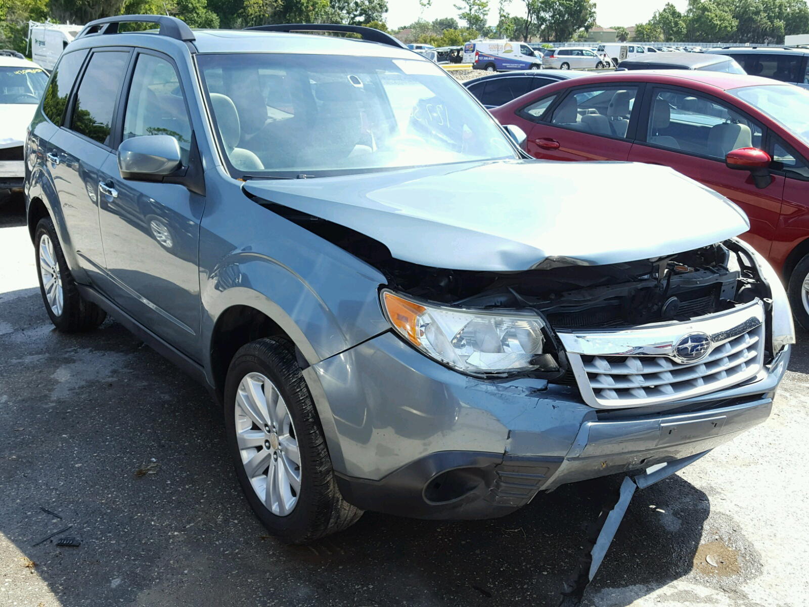 SUBARU FORESTER 2 2011 with VIN JF2SHBDCXBG775936 - Photo from auction
