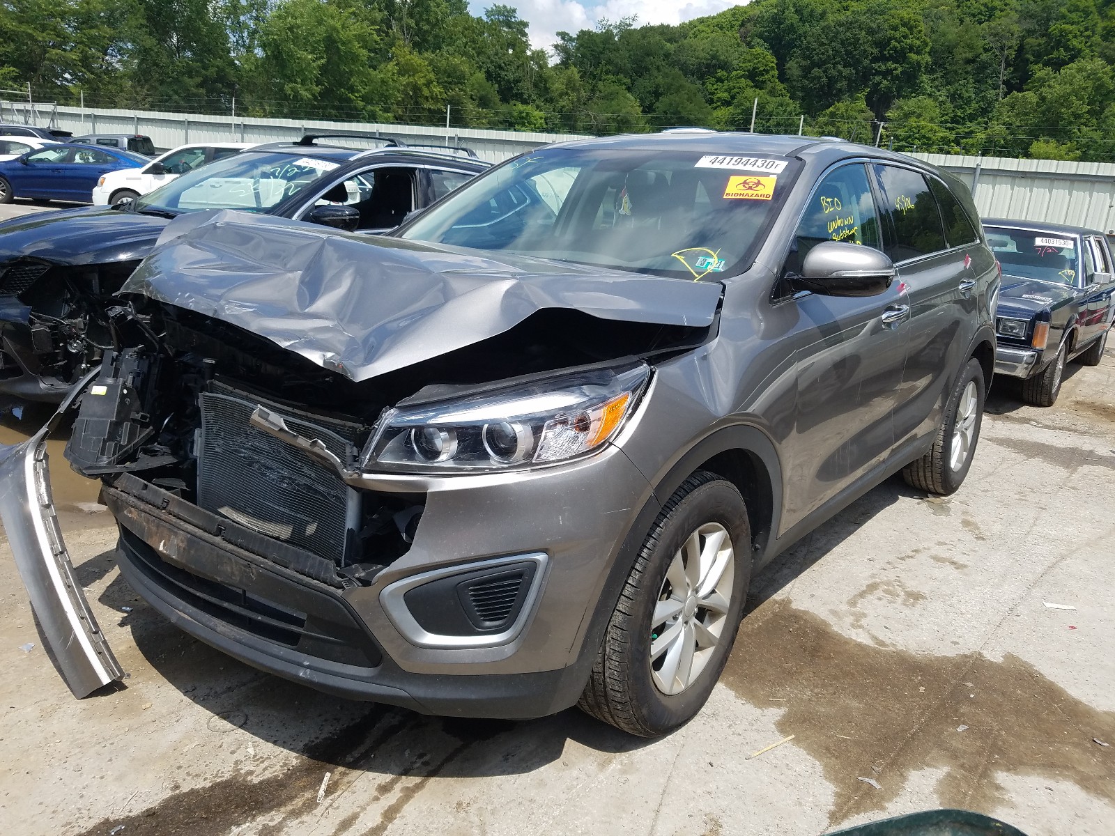 Photo 2 from auction – 2016 KIA SORENTO LX with VIN 5XYPG4A39GG016955