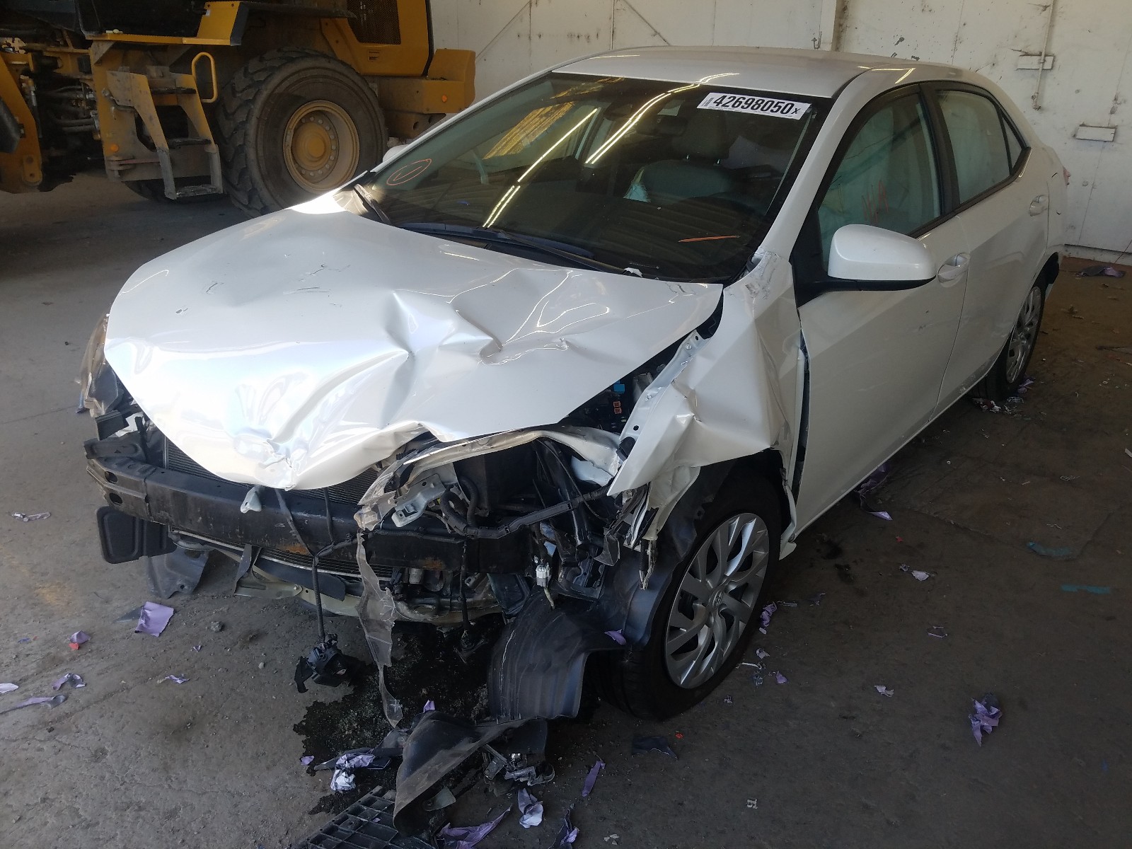 Photo 2 from auction – 2019 TOYOTA COROLLA L with VIN 5YFBURHE5KP869414