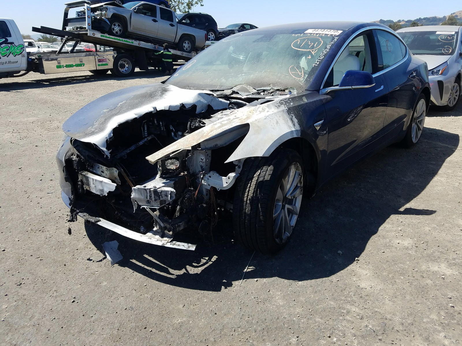 Photo 2 from auction – 2019 TESLA MODEL 3 with VIN 5YJ3E1EA2KF332838