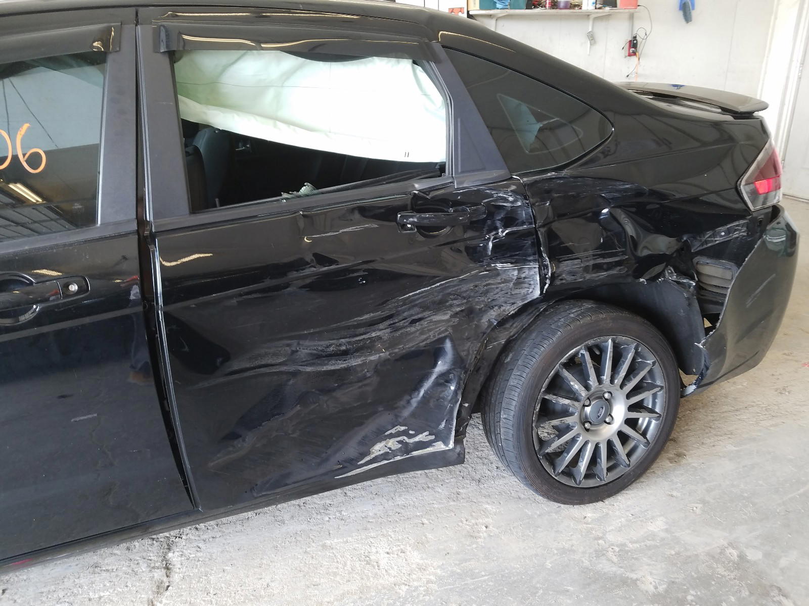 Photo 9 from auction – 2011 FORD FOCUS SES with VIN 1FAHP3GN9BW128941