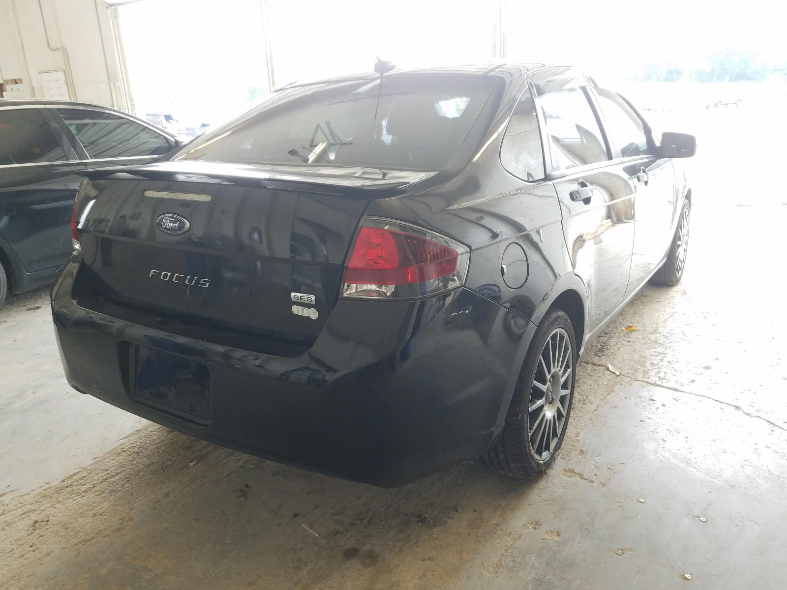 Photo 4 from auction – 2011 FORD FOCUS SES with VIN 1FAHP3GN9BW128941
