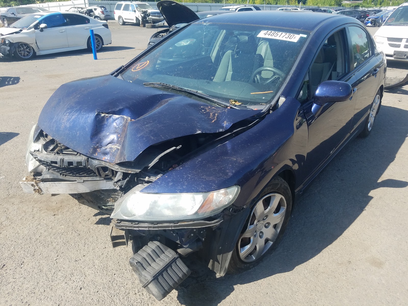 Photo 2 from auction – 2010 HONDA CIVIC LX with VIN 19XFA1F53AE052781
