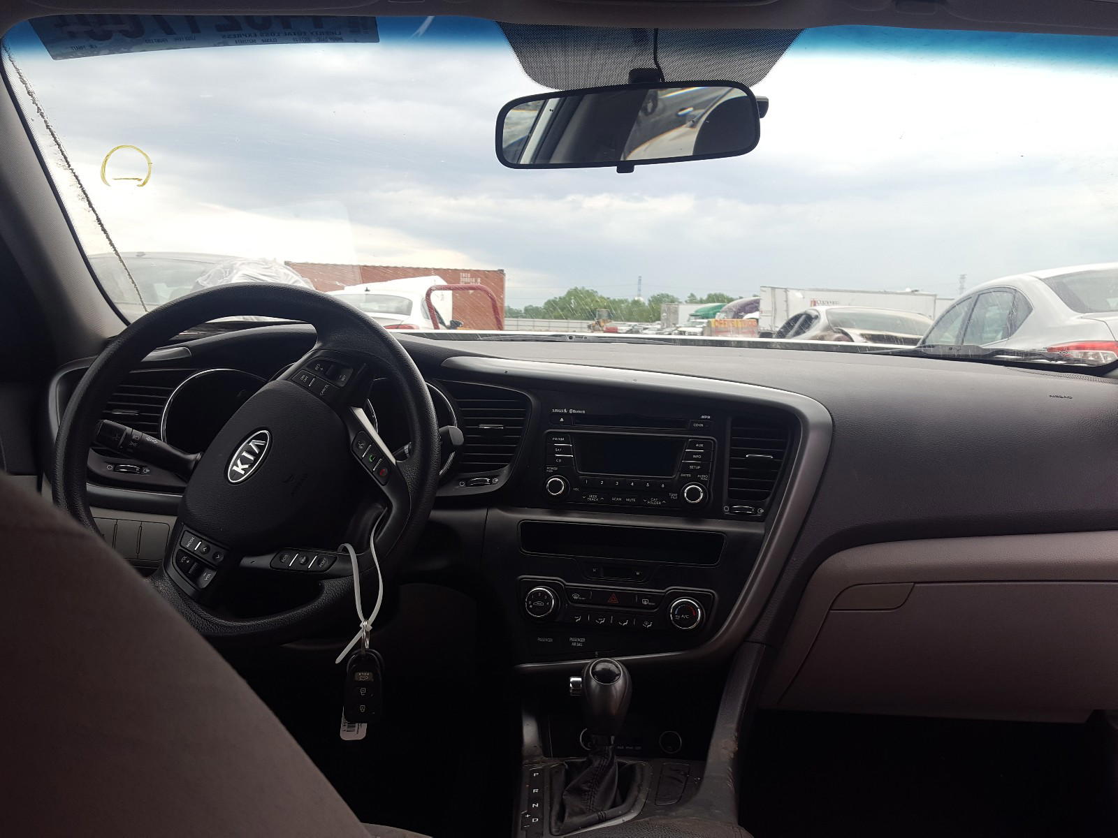 Photo 9 from auction – 2011 KIA OPTIMA LX with VIN KNAGM4A7XB5146477