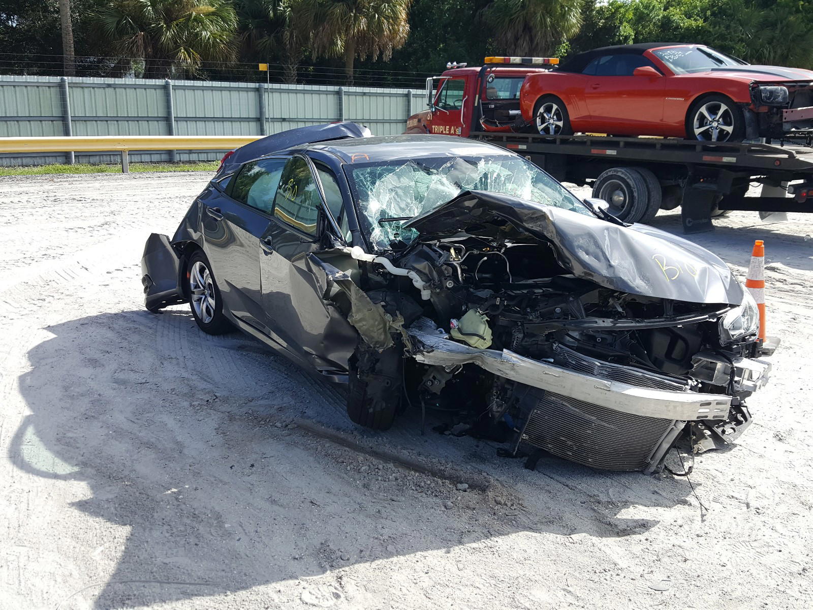 HONDA CIVIC LX 2017 with VIN 19XFC2F56HE030235 - Photo from auction