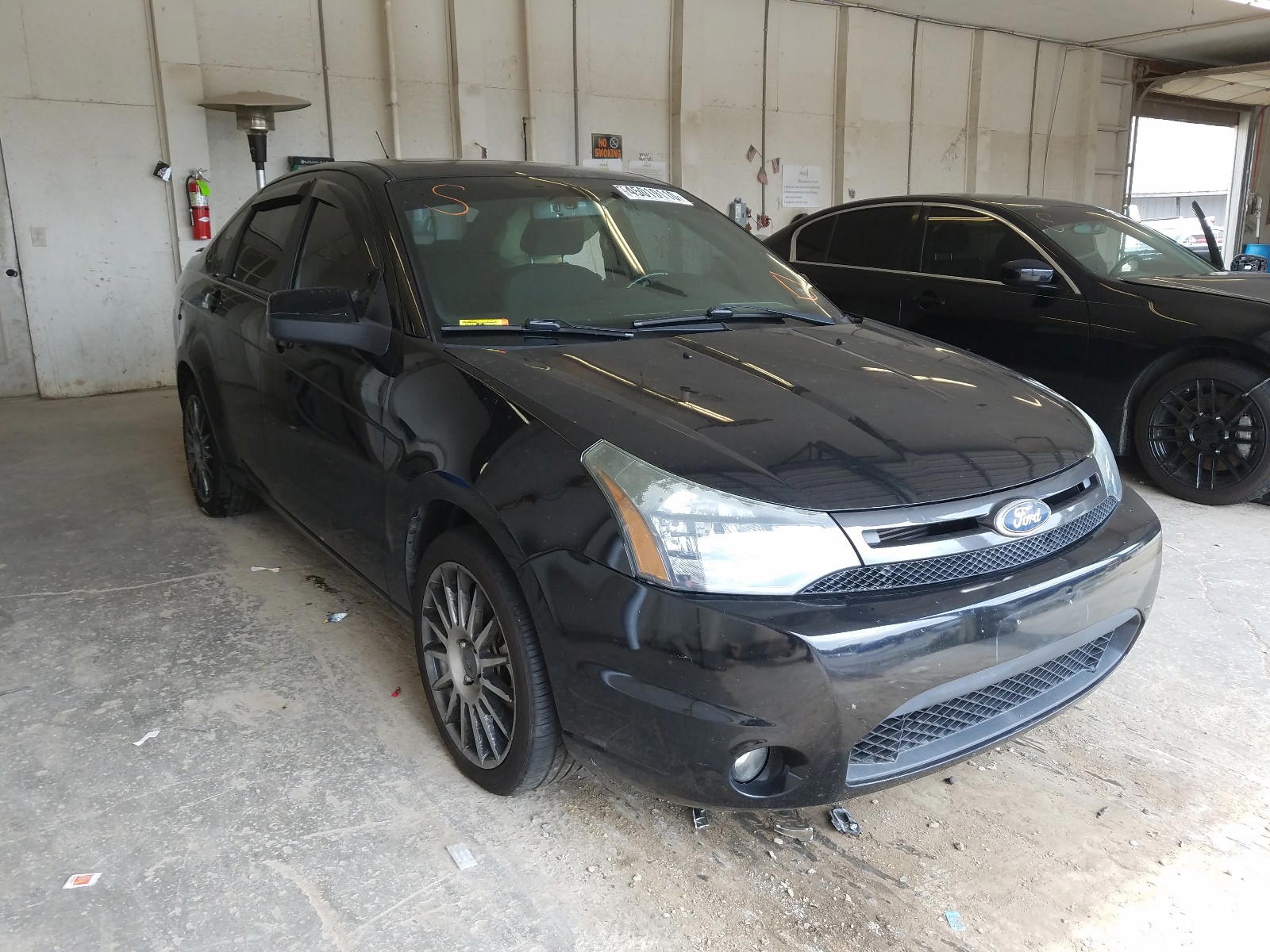 FORD FOCUS SES 2011 with VIN 1FAHP3GN9BW128941 - Photo from auction
