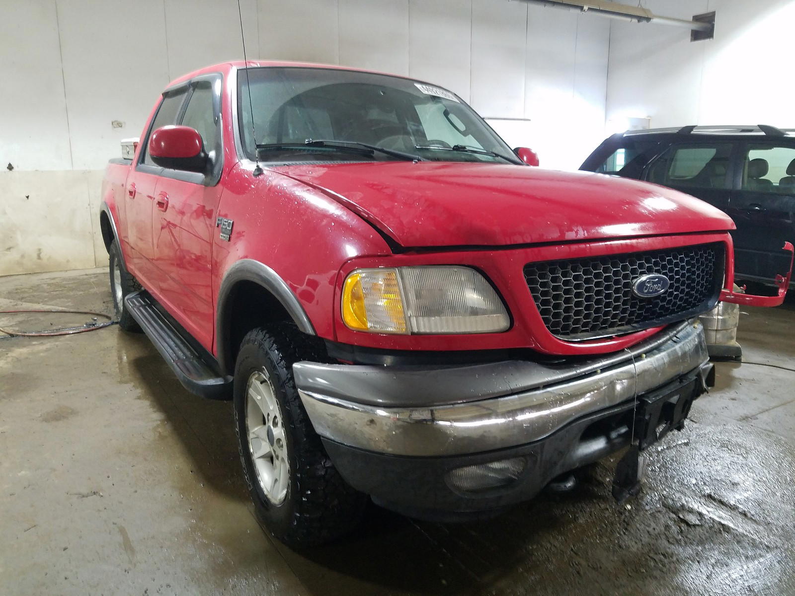 FORD F150 SUPER 2002 with VIN 1FTRW08L72KD39012 - Photo from auction