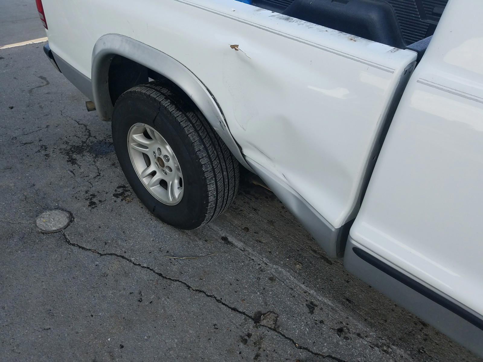 Photo 9 from auction – 2004 DODGE DAKOTA SLT with VIN 1D7GL42N44S735070