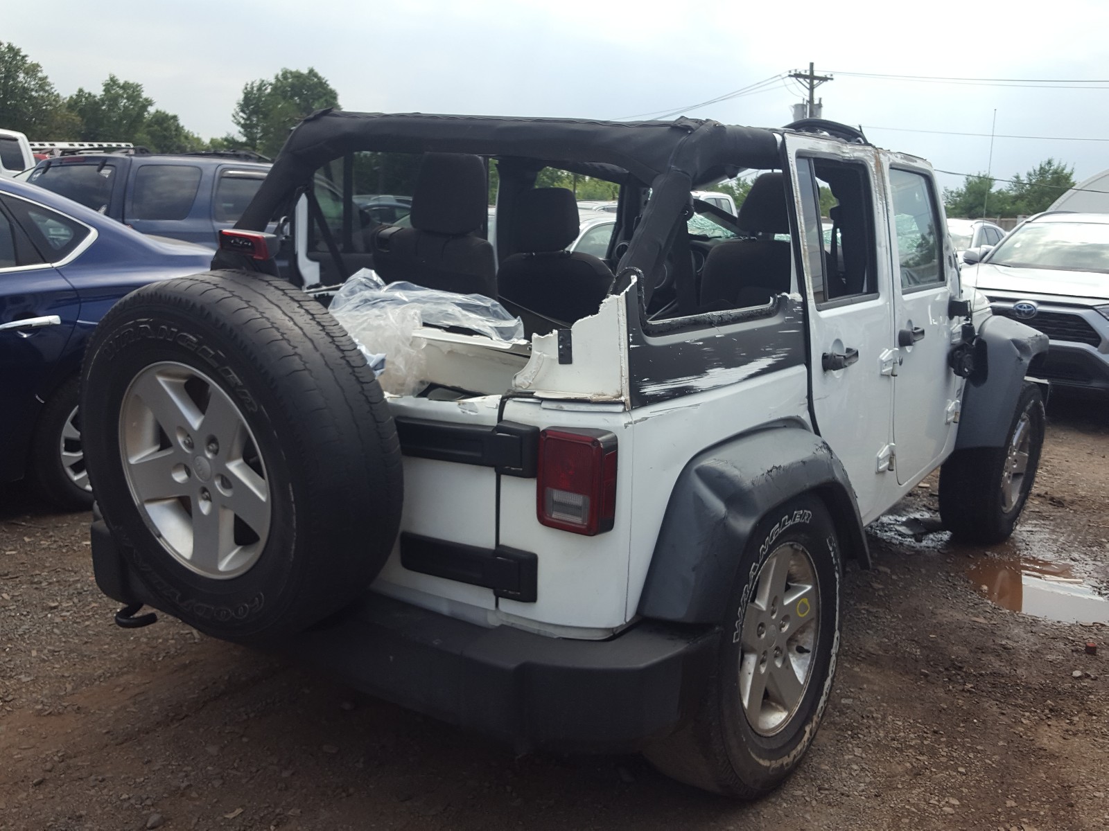 Photo 4 from auction – 2013 JEEP WRANGLER U with VIN 1C4HJWDGXDL648573