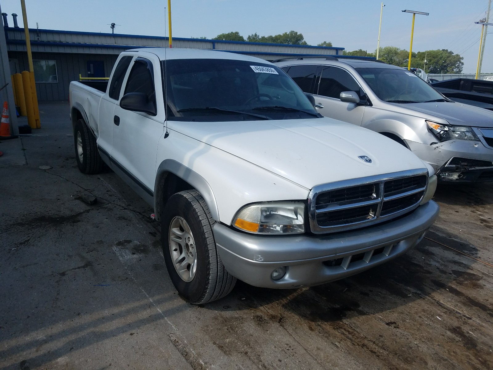 DODGE DAKOTA SLT 2004 z numerem VIN 1D7GL42N44S735070 - Zdjęcie z aukcji